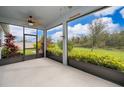 Screened patio with great backyard views, offering a relaxing outdoor space at 12191 Sumter Dr, Orlando, FL 32824