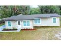 Charming single-story home featuring a newer roof, updated windows and a freshly painted exterior at 5390 E Hinson Ave, Haines City, FL 33844