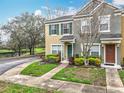 Beautiful townhome near a pond and park, surrounded by mature trees at 1410 Stockton Dr, Sanford, FL 32771