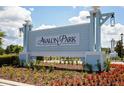 Entrance to the Avalon Park community with decorative landscaping and a welcoming sign at 2715 Rowan St, Tavares, FL 32778