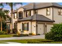 Beautiful two-story home featuring well-maintained landscaping and a three-car garage at 3123 Bentonshire Pl, Longwood, FL 32779