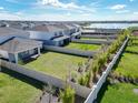 A spacious backyard with an extended fence and lush green space at 13348 Panama Beach Ct, Orlando, FL 32827
