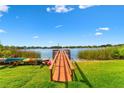 Community dock with canoes and waterfront access at 4312 Lake Underhill Rd # 19, Orlando, FL 32803