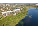 Lakefront condo community with swimming pool, dock, and stunning nature views at 6336 Buford St # 706, Orlando, FL 32835