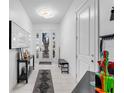 Bright entryway with a contemporary light fixture and modern decor at 3007 E Central Blvd # 3007, Orlando, FL 32803
