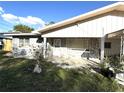 Charming single-story home with covered porch and stone accents at 1808 4Th Se Ct, Winter Haven, FL 33880