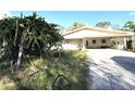 Single-story home with covered carport at 1808 4Th Se Ct, Winter Haven, FL 33880