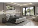 Stylish primary bedroom features a king bed, hardwood floors, modern lighting, and windows at 1702 Arbor Park Dr, Winter Park, FL 32789