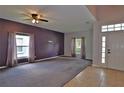 Spacious living room featuring a large window for natural light at 1862 Great Falls Way, Orlando, FL 32824
