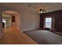 Inviting living room with modern ceiling fan and neutral decor at 1862 Great Falls Way, Orlando, FL 32824
