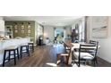 Open concept living room and dining area with natural light and modern decor at 3170 Partington Blvd, Davenport, FL 33837