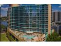 Relaxing condo pool area with patio seating, great for outdoor enjoyment at 322 E Central Blvd # 1805, Orlando, FL 32801