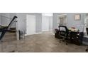 Versatile space featuring a tile floor, and lots of natural light at 10566 Green Ivy Ln, Orlando, FL 32832