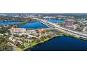 Aerial view showing the property's lakeshore location, nearby highway and city landscape at 320 Lakeview St # 316, Orlando, FL 32804