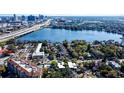 Aerial view of lakefront property, showcasing waterfront access and lush landscaping at 320 Lakeview St # 316, Orlando, FL 32804