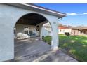 Charming one-story home featuring a covered carport and well-kept lawn on a bright day at 1207 Rich Moor Cir, Orlando, FL 32807