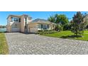 Beautiful two-story home with attached garage and meticulously landscaped front yard at 1320 Myrtle Dr, Longwood, FL 32750