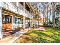 Outdoor patio area with seating overlooking the waterfront at 2118 Lake Dr, Winter Park, FL 32789