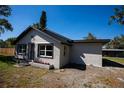 Well-maintained home featuring new windows, fresh paint, and manicured garden beds at 4452 Fairview Ave, Orlando, FL 32804