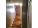 Hallway featuring wood-look floors, and a closet at 7706 Country Pl # 7706, Winter Park, FL 32792