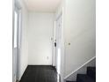 Clean entryway with tile flooring leading to the interior with stairs at 3057 Aaron Burr Ave # 1, Winter Park, FL 32792