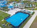 Community amenity showcasing a well-maintained basketball court and proximity to other recreation at 3356 Lilac Way, Davenport, FL 33897