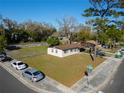 An aerial view displays a well-situated home with ample yard space and convenient street access in a peaceful locale at 925 Valleydale Ave, Deland, FL 32720