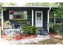 Inviting front porch with a welcome mat leading to a classic white door at 115 W King St, Orlando, FL 32804