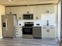 Modern kitchen with stainless steel appliances, ample cabinet space and a bright atmosphere at 155 S Court Ave # 1506, Orlando, FL 32801