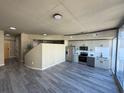 Spacious open-concept living room with modern flooring and great natural light at 155 S Court Ave # 1506, Orlando, FL 32801
