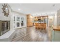 Open concept kitchen with an island, stainless steel appliances, and sliding door to patio at 811 Gatehouse Dr, Winter Springs, FL 32708