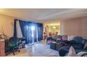 Bright and airy living room featuring tile floors and plenty of natural light at 4161 Versailles Dr # 4161G, Orlando, FL 32808