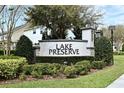 Community entrance sign displaying the neighborhood name, Lake Preserve, surrounded by beautiful landscaping at 3237 Palatka St, Orlando, FL 32824