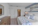 Well-lit bedroom with a coastal decor, plush carpet, and ample space at 3893 Diving Dove Ln, Bartow, FL 33830