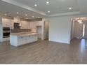 Open-concept floorplan, perfect for entertaining, featuring lots of natural light and designer finishes at 4203 Barbuda Ln, Kissimmee, FL 34758