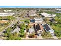 An aerial view shows the property's lot and surrounding neighborhood at 859 Neuse Ave, Orlando, FL 32804