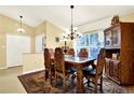 Open dining area featuring a decorative table set, patterned rug, and lots of natural light at 4721 Tara View Road, Leesburg, FL 34748