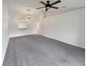 Bright and airy living room with neutral walls and plush carpeting at 1817 Christina Lee Ln, St Cloud, FL 34769