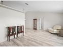 Spacious living room boasts neutral walls, wood floors, and arched doorways for an airy feel at 2540 Courtland Blvd, Deltona, FL 32738