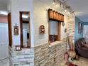 Open-concept living area showcasing stone accent wall detail and pass-through to the kitchen at 8830 Coral Palms Ct # A, Kissimmee, FL 34747