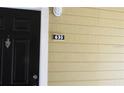 View of the front door and house number 635 of this home at 1083 S Hiawassee Rd # 635, Orlando, FL 32835