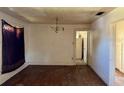 Dining room with natural light and vintage chandelier at 1811 S Westmoreland Dr, Orlando, FL 32805