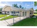 Covered carport adjacent to the house provides convenient parking and covered access at 15 Palmira Rd, Debary, FL 32713