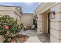 Inviting front porch with comfortable wicker chairs and a charming outdoor ambiance at 8929 Charleston Park # 12, Orlando, FL 32819