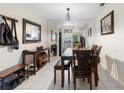 Cozy dining area adjacent to the kitchen, featuring modern decor and ample seating at 4376 Lake Underhill Rd # C, Orlando, FL 32803