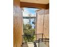 Enjoy serene water views from the condo's balcony, perfect for relaxing and unwinding at 3428 Soho St # 308, Orlando, FL 32835