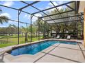 This gorgeous screened-in pool offers a peaceful retreat, perfect for swimming and relaxing in privacy at 3850 Eagle Isle Cir, Kissimmee, FL 34746