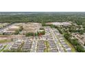 Aerial view of a residential neighborhood with homes, streets, and green spaces at 1212 Bear Oak Ln, Deland, FL 32720