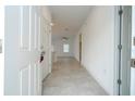 Bright foyer with tile flooring, leading into the home's living spaces at 3922 Sw 130Th Loop, Ocala, FL 34473