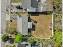 A bird's eye view of the property, highlighting the expansive backyard and the property's well-defined boundaries at 1868 Wayside Dr, Orlando, FL 32818